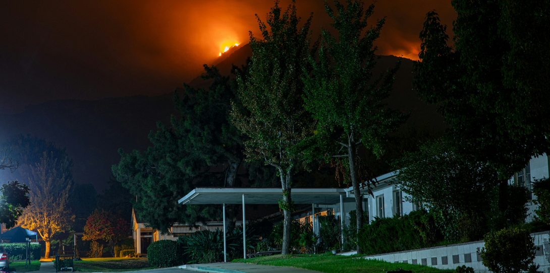 A photo showing a 2020 wildfire in Monrovia, California. The 2020 California wildfire season burned more than 4 million acres of land and caused billions of dollars in damages.