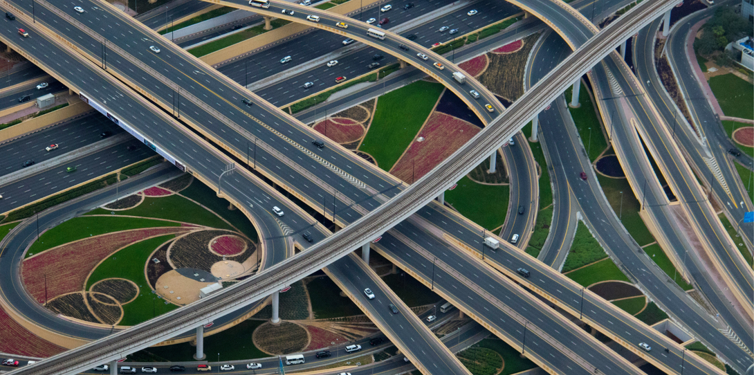 An image of a highway with cars, illustrating transportation infrastructure